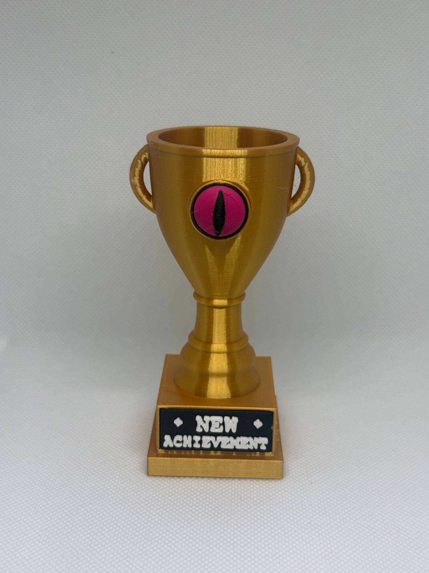 Plot Twist Prints: DCC trophies