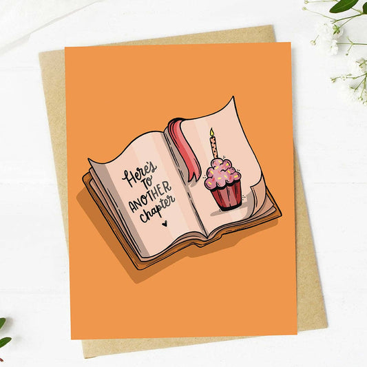 "Here's to another chapter" Bookish Birthday Card