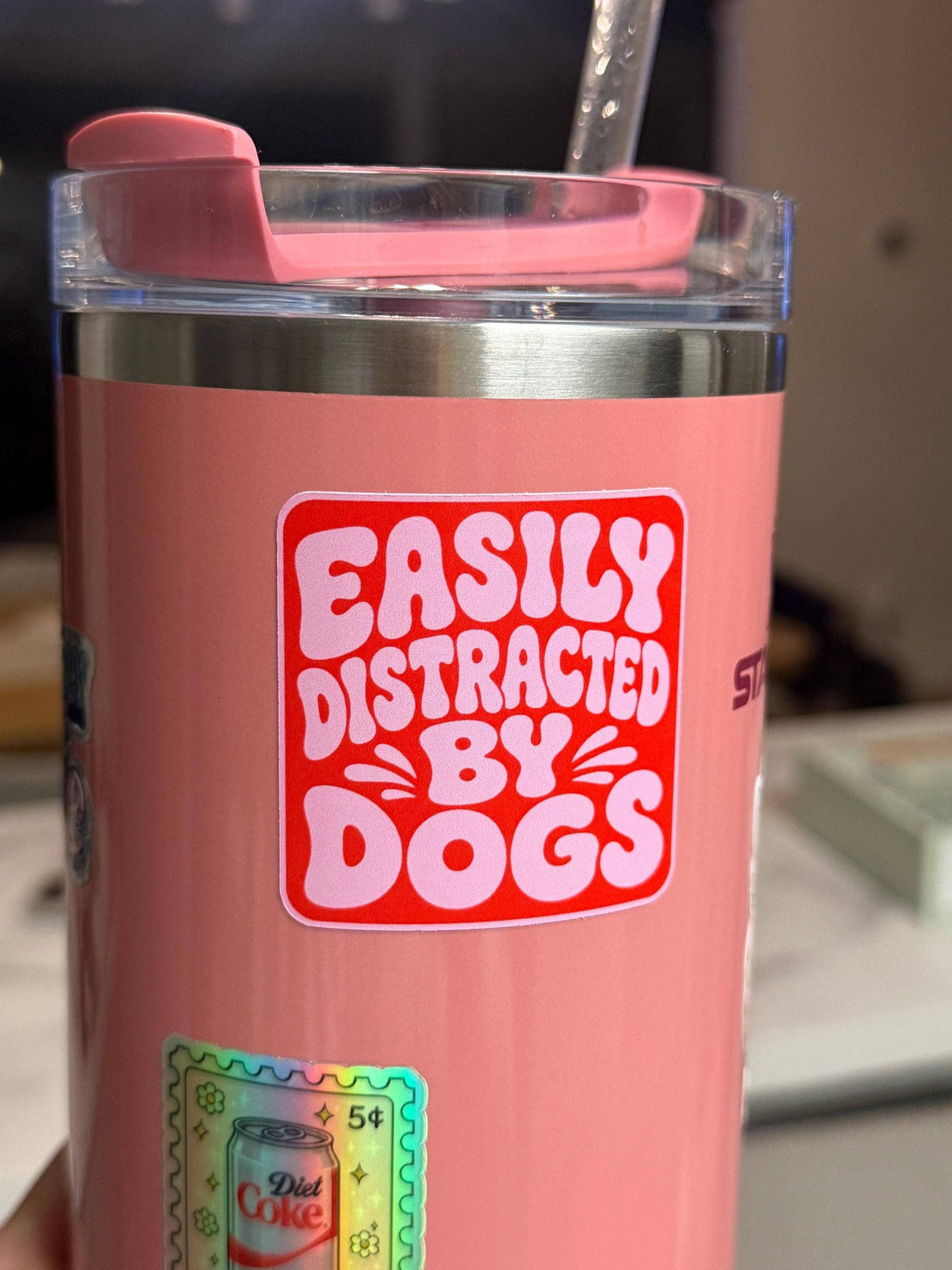 Easily Distracted by Dogs vinyl sticker: Pink