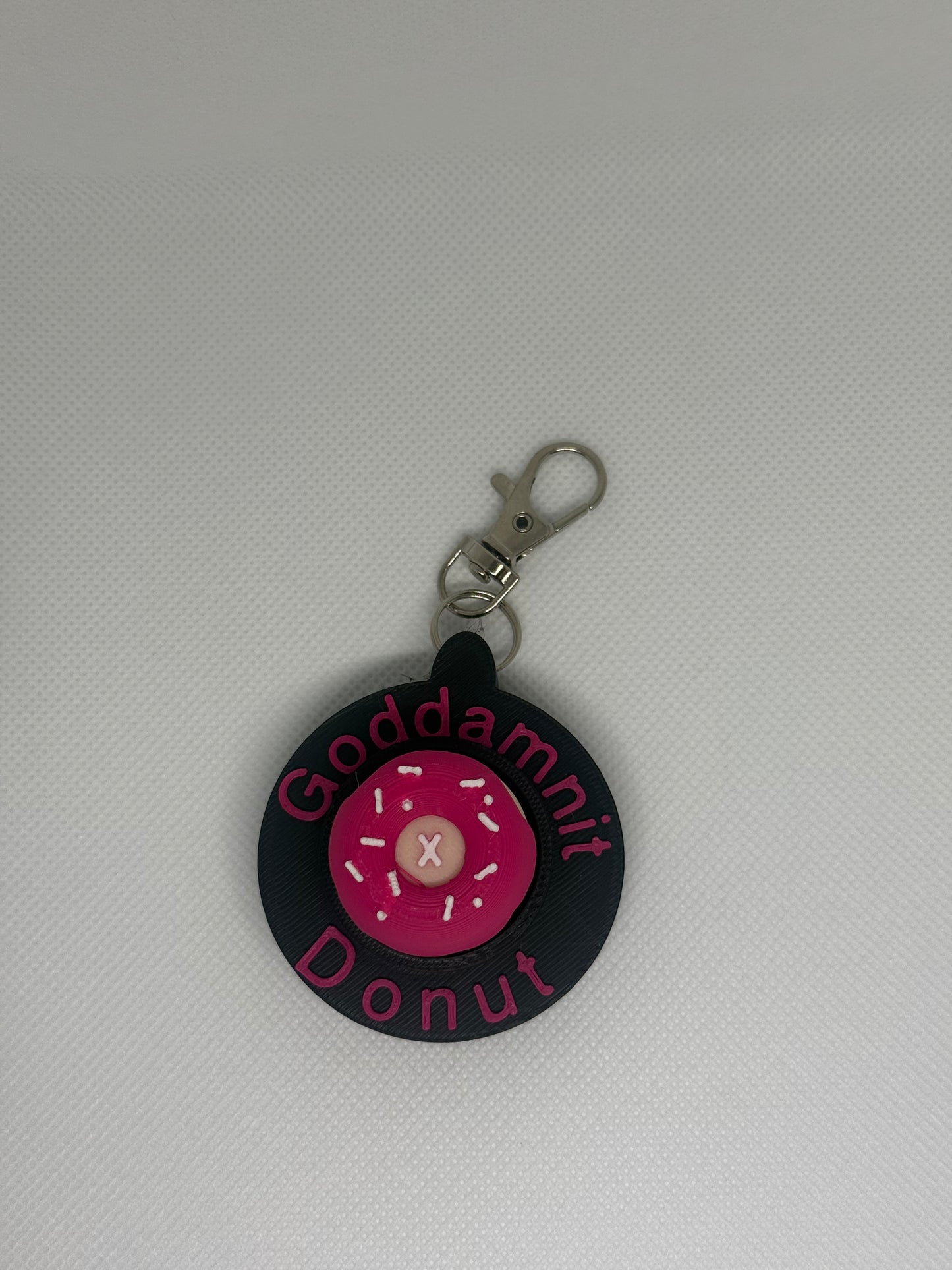 Plot Twist Prints: DCC donut fidget Keychain