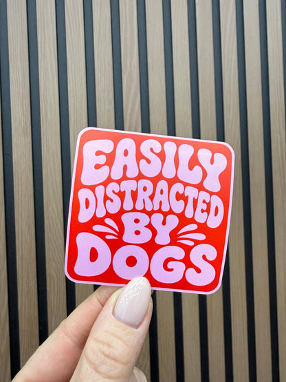 Easily Distracted by Dogs vinyl sticker: Pink