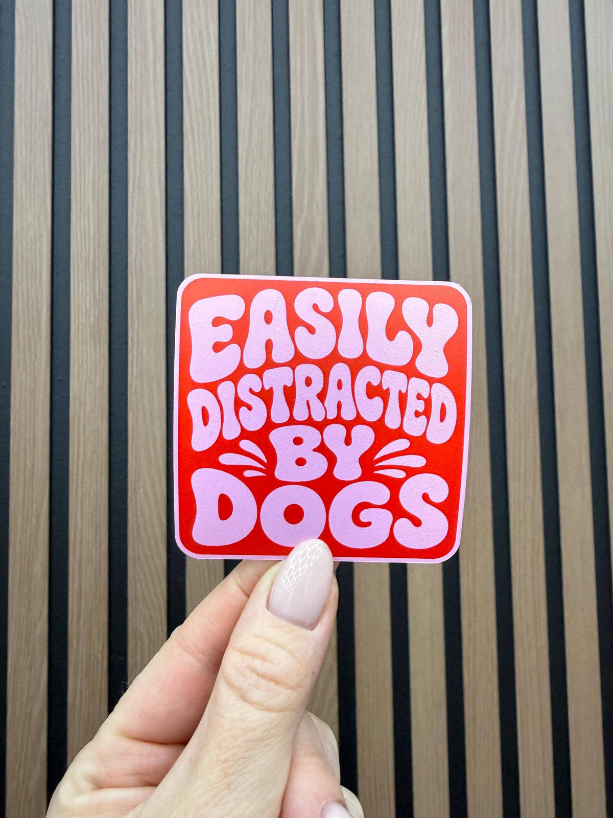 Easily Distracted by Dogs vinyl sticker: Pink
